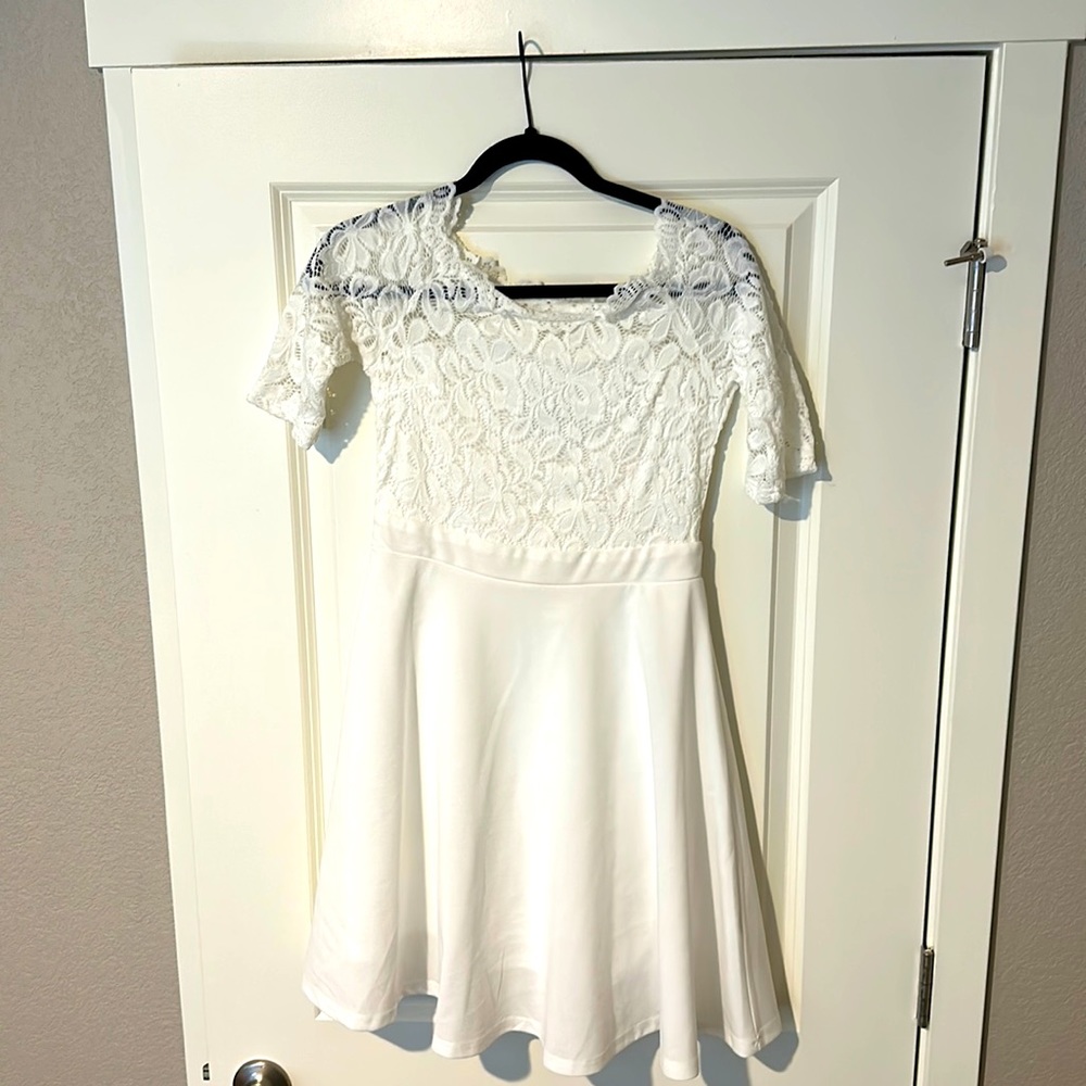 Wore this dress once for my wedding rehearsal! Don’t need anymore. Like new.